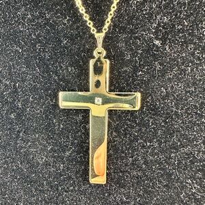 14KT Gold electroplated cross with 5pt handset CZ/diamond stone.